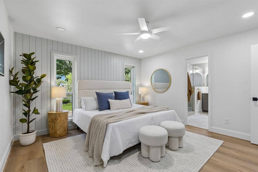 12124 Dixfield Drive, Dallas, TX 75218 Wood-finish flooring, recessed lighting, and a ceiling fan are featured