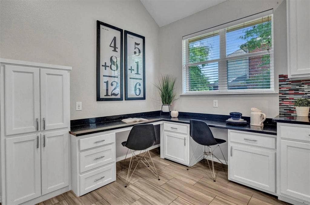 1601 Long Prairie Court, Allen, TX 75002 Built-in desk area with white cabinetry, dark countertops, and wood-finish flooring