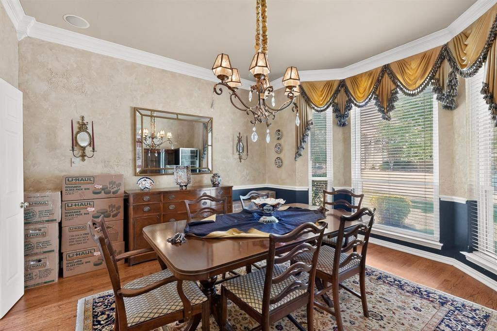 3820 Nash Lane, Plano, TX 75025 Hardwood flooring, crown molding, chandelier lighting, sconce wall lighting, bay window