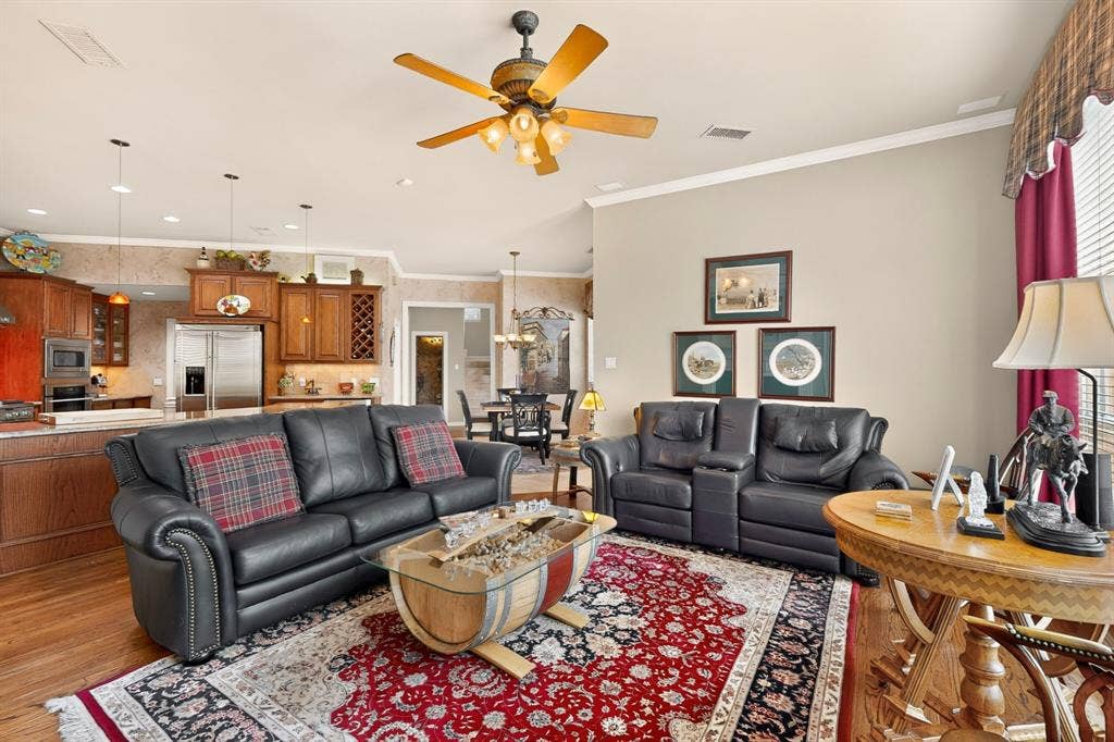 3820 Nash Lane, Plano, TX 75025 Wood-finish flooring with a ceiling fan overhead