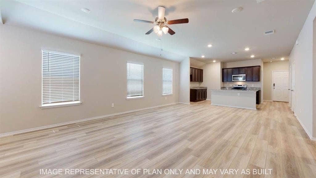 3016 Cyprian Road, Lorena, TX 76655 Open-concept living area with wood-finish flooring, a ceiling fan, and recessed lighting