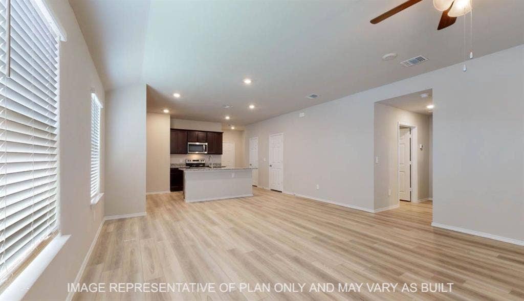 3016 Cyprian Road, Lorena, TX 76655 Expansive room featuring wood-finish flooring, recessed lighting, and a ceiling fan