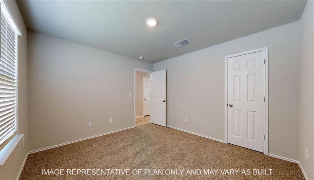 3016 Cyprian Road, Lorena, TX 76655 Recessed ceiling light, neutral wall color, carpeted flooring, white paneled doors, and window with horizontal blinds