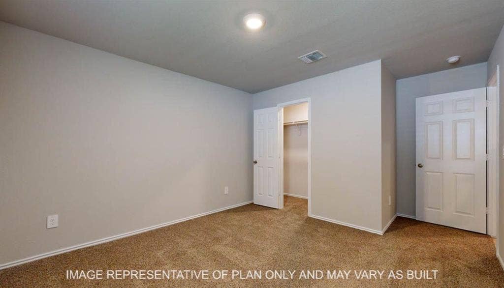 3016 Cyprian Road, Lorena, TX 76655 Neutral wall paint, plush carpet flooring, recessed lighting, and a built-in closet