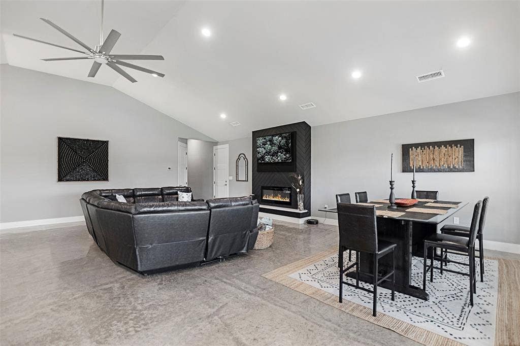620 Ewing Road, Ferris, TX 75125 Living, Dining, Sealed Concrete Floors. Electric Fireplace.