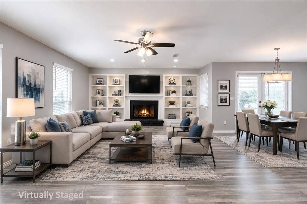 1223 Sequoia Drive, DeSoto, TX 75115 Open-concept living area with wood-finish flooring, a built-in fireplace with a mantel, integrated shelving, and recessed lighting
