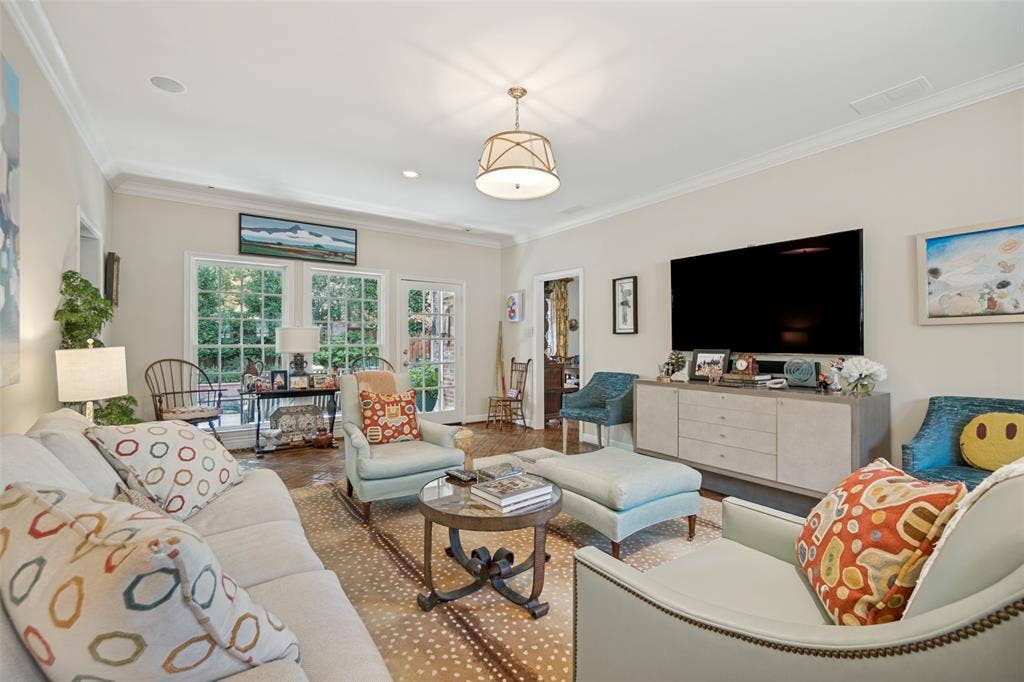 3418 Dartmouth Avenue, Highland Park, TX 75205 Recessed lighting, crown molding, wood-finish flooring, French doors, and an elegant drum pendant light