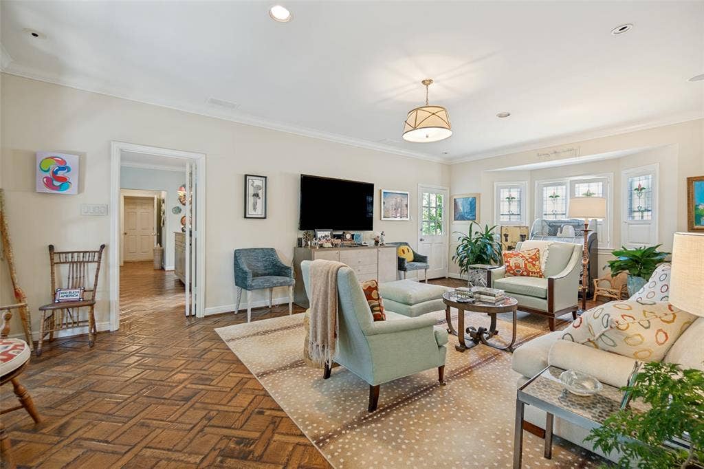 3418 Dartmouth Avenue, Highland Park, TX 75205 Recessed lighting, wood-finish flooring with a herringbone pattern, bay windows, crown molding, and a drum-style ceiling fixture