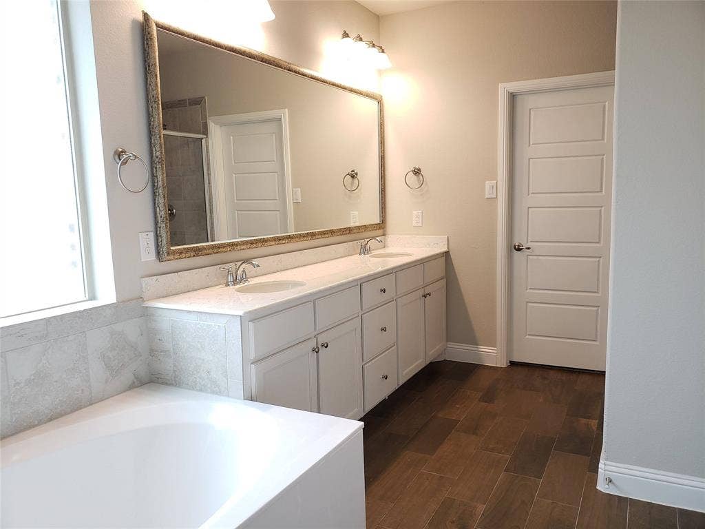 940 Parkside Drive, Argyle, TX 76226 Primary Bath with Dual vanity with white cabinetry, light-colored countertops, and undermount sinks