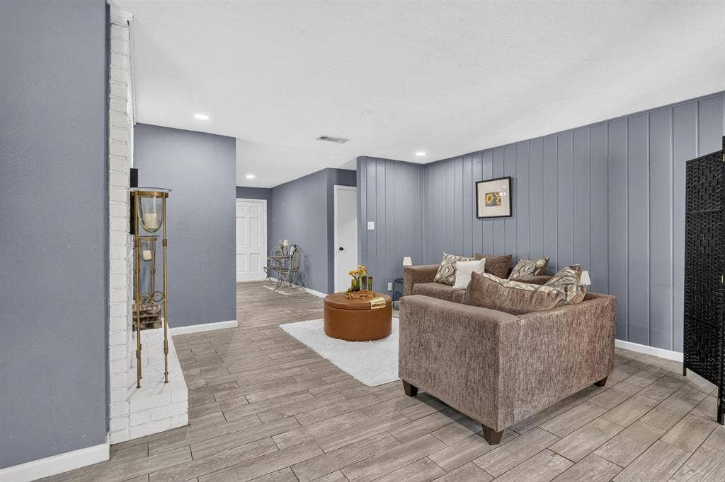 8117 Rush Street, Benbrook, TX 76116 Wood-finish flooring throughout the space