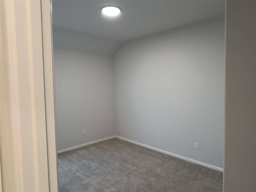 320 Leopold Trail, Greenville, TX 75402 Recessed ceiling light, neutral wall paint, and gray carpeting