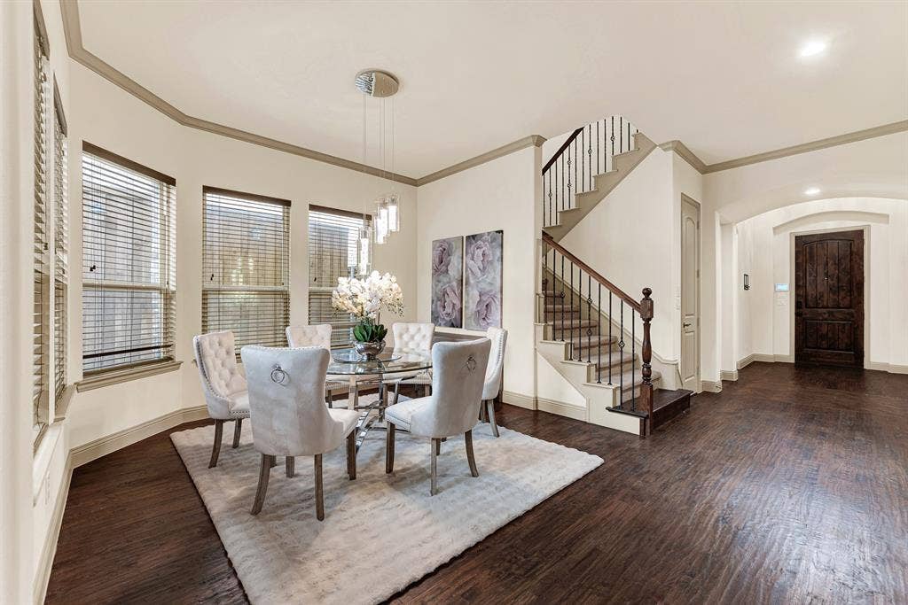7013 BROOK FOREST Circle, Plano, TX 75024 Graceful archways connect seamlessly to the open staircase, creating an airy sense of volume throughout the main living level. It is naturally suited for lively holiday celebrations where conversation drifts effortlessly from welcoming guests at the foyer to gathering around dinner.