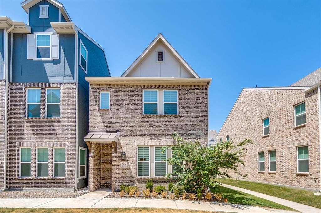 7536 Laburnam Road, Dallas, TX 75228 Brick exterior with gabled roofline, covered entry, and multiple windows