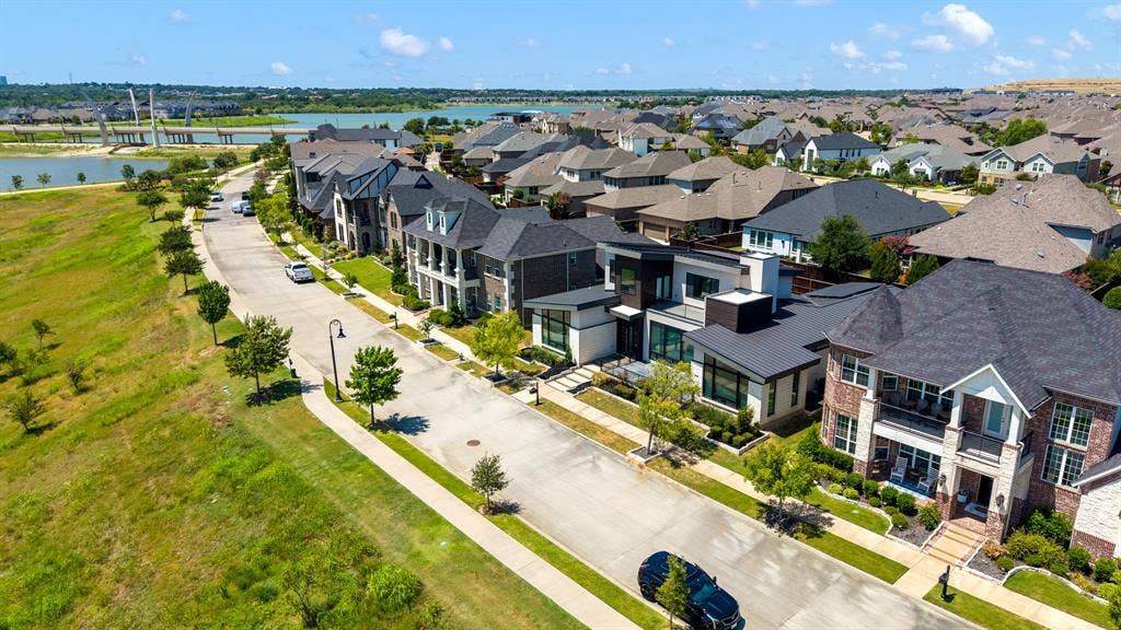 1321 Black Walnut Lane, Arlington, TX 76005 Prestigious estate-style home anchoring a manicured streetscape within a planned community