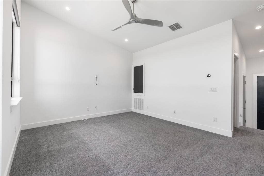 1321 Black Walnut Lane, Arlington, TX 76005 Spacious room with fresh white walls, neutral carpet flooring, and recessed ceiling lighting