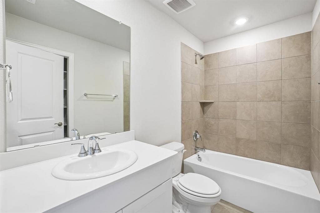 2138 Longchamp Lane, Seagoville, TX 75159 Photo is not of the actual home, but is an inspirational photo of builder’s model home and may depict options, furnishings, and/or decorator features that are not included.
