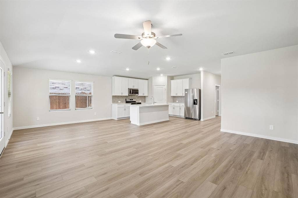 2138 Longchamp Lane, Seagoville, TX 75159 Photo is not of the actual home, but is an inspirational photo of builder’s model home and may depict options, furnishings, and/or decorator features that are not included.