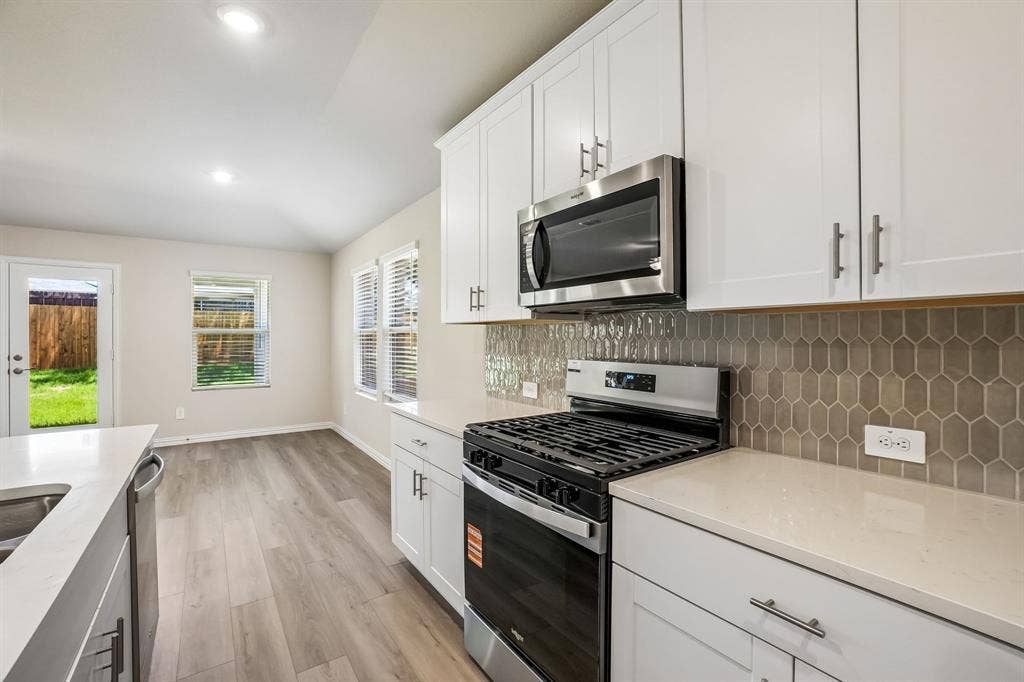 2138 Longchamp Lane, Seagoville, TX 75159 Photo is not of the actual home, but is an inspirational photo of builder’s model home and may depict options, furnishings, and/or decorator features that are not included.