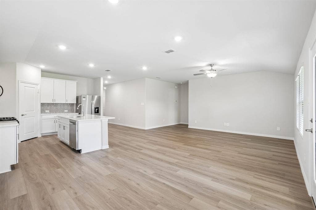 2138 Longchamp Lane, Seagoville, TX 75159 Photo is not of the actual home, but is an inspirational photo of builder’s model home and may depict options, furnishings, and/or decorator features that are not included.