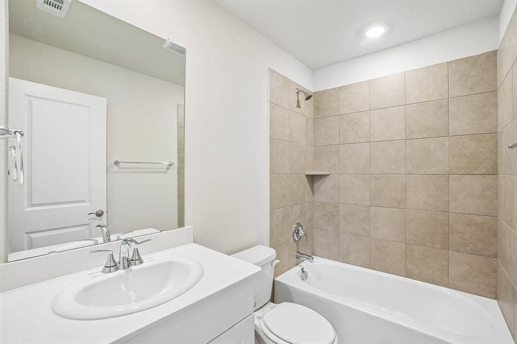 2138 Longchamp Lane, Seagoville, TX 75159 Photo is not of the actual home, but is an inspirational photo of builder’s model home and may depict options, furnishings, and/or decorator features that are not included.