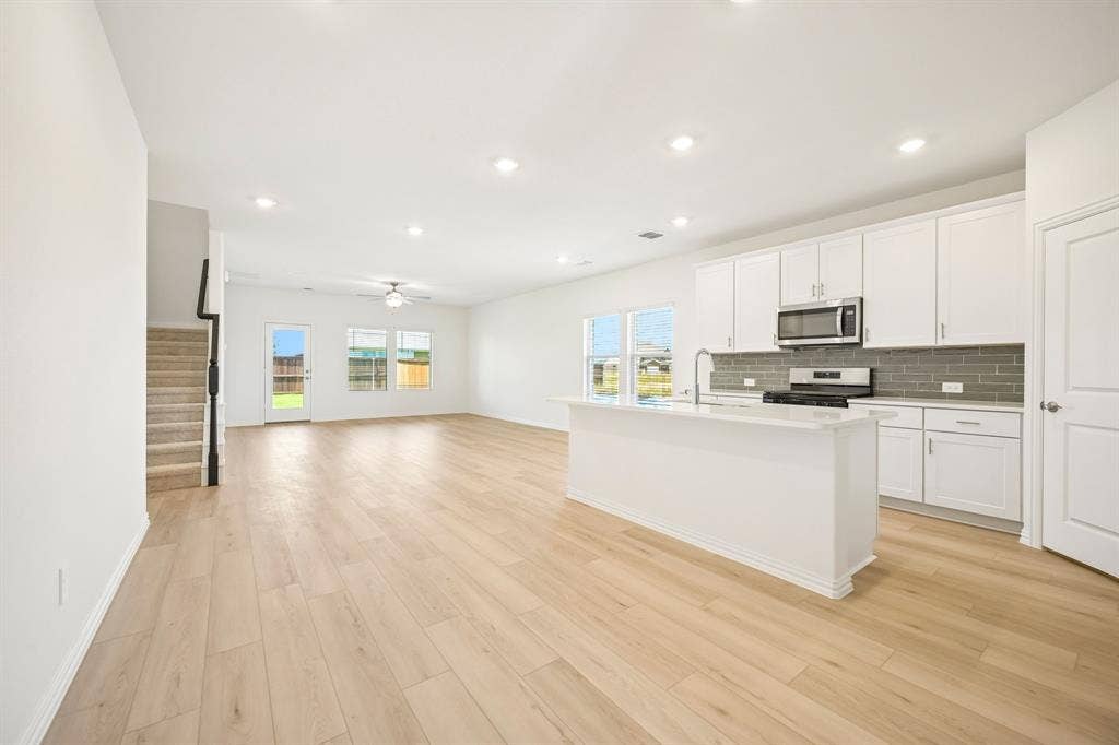 2130 Longchamp Lane, Seagoville, TX 75159 Photo is not of the actual home, but is an inspirational photo of builder’s model home and may depict options, furnishings, and/or decorator features that are not included.