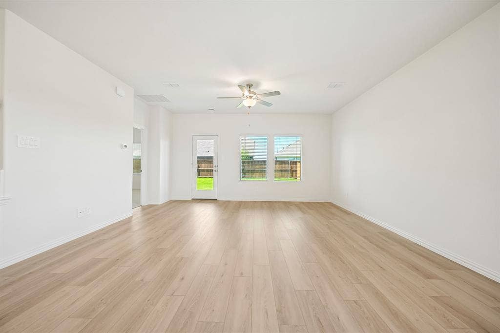 2130 Longchamp Lane, Seagoville, TX 75159 Photo is not of the actual home, but is an inspirational photo of builder’s model home and may depict options, furnishings, and/or decorator features that are not included.