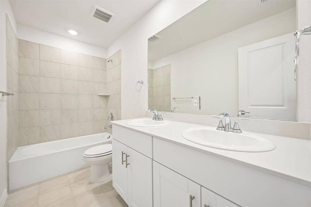 2130 Longchamp Lane, Seagoville, TX 75159 Photo is not of the actual home, but is an inspirational photo of builder’s model home and may depict options, furnishings, and/or decorator features that are not included.