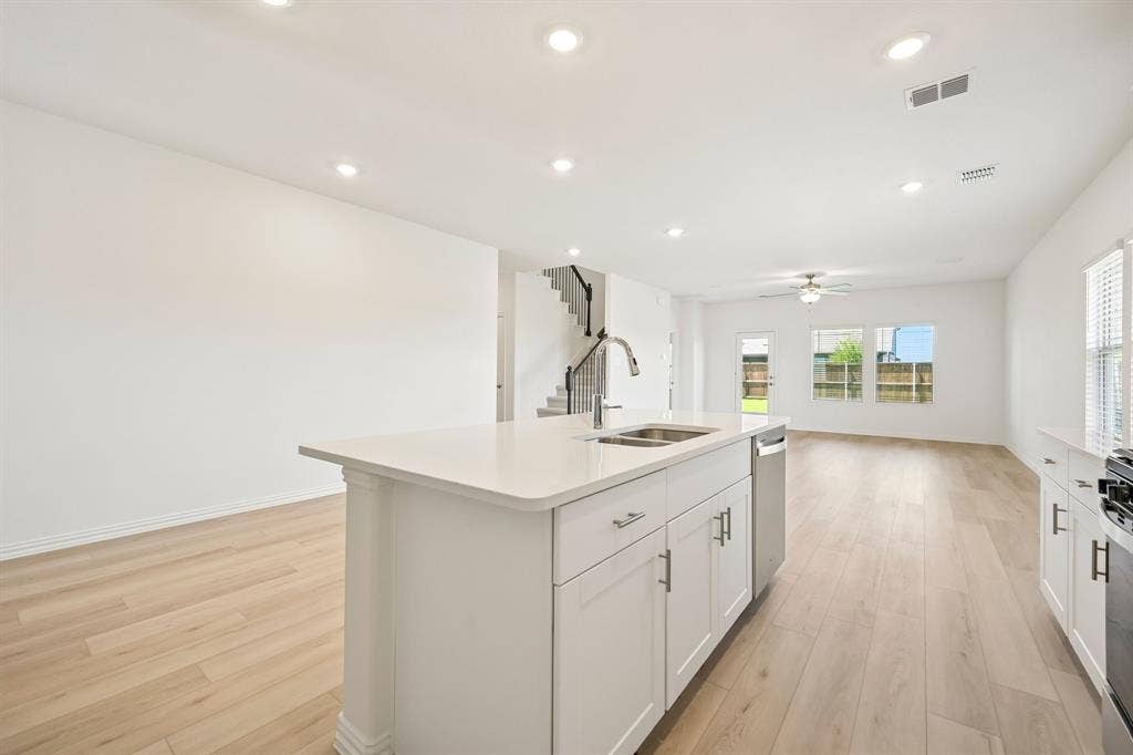 2130 Longchamp Lane, Seagoville, TX 75159 Photo is not of the actual home, but is an inspirational photo of builder’s model home and may depict options, furnishings, and/or decorator features that are not included.