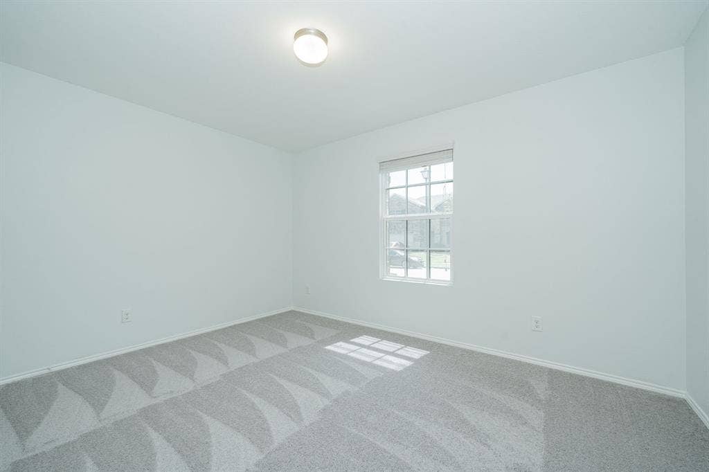 122 Feverbush Drive, Fate, TX 75189 Unfurnished room featuring carpet and baseboards