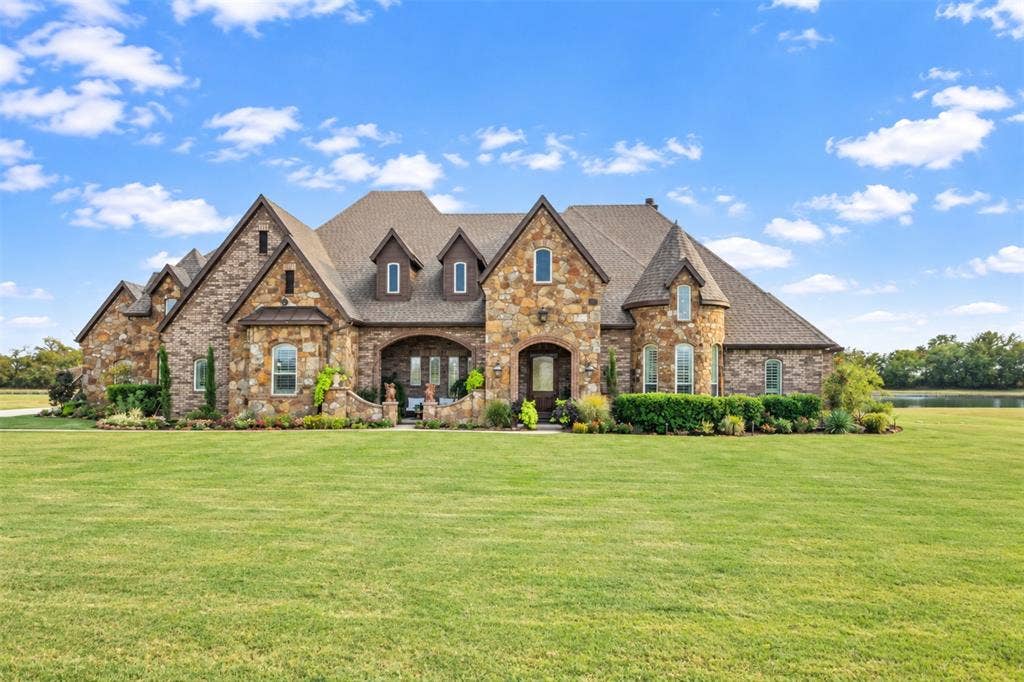 623 Calm Water Cove, Princeton, TX 75407 Stone and brick exterior with multiple gables