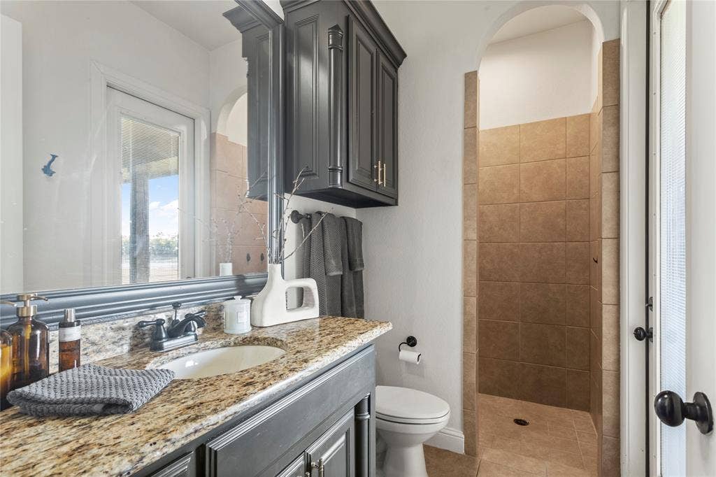 623 Calm Water Cove, Princeton, TX 75407 Future Pool Bath. Door to patio.