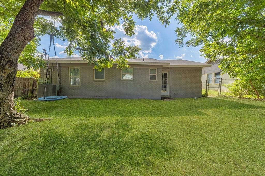 726 Royal Crest, Mesquite, TX 75149 Back of house with brick siding