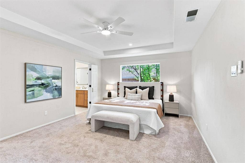 2411 Aspen Street, Richardson, TX 75082 Tray ceiling with recessed lighting and a ceiling fan