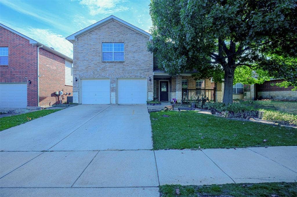 9017 Graywolf Ridge Trail, Fort Worth, TX 76244 View of property featuring a garage