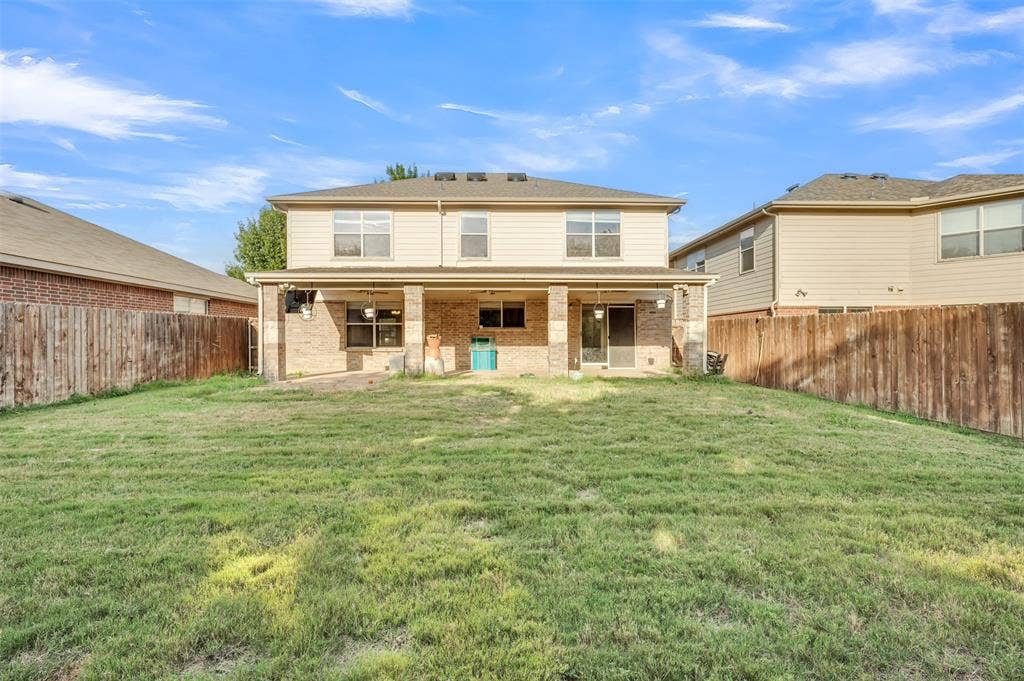 9017 Graywolf Ridge Trail, Fort Worth, TX 76244 Back of property featuring a yard