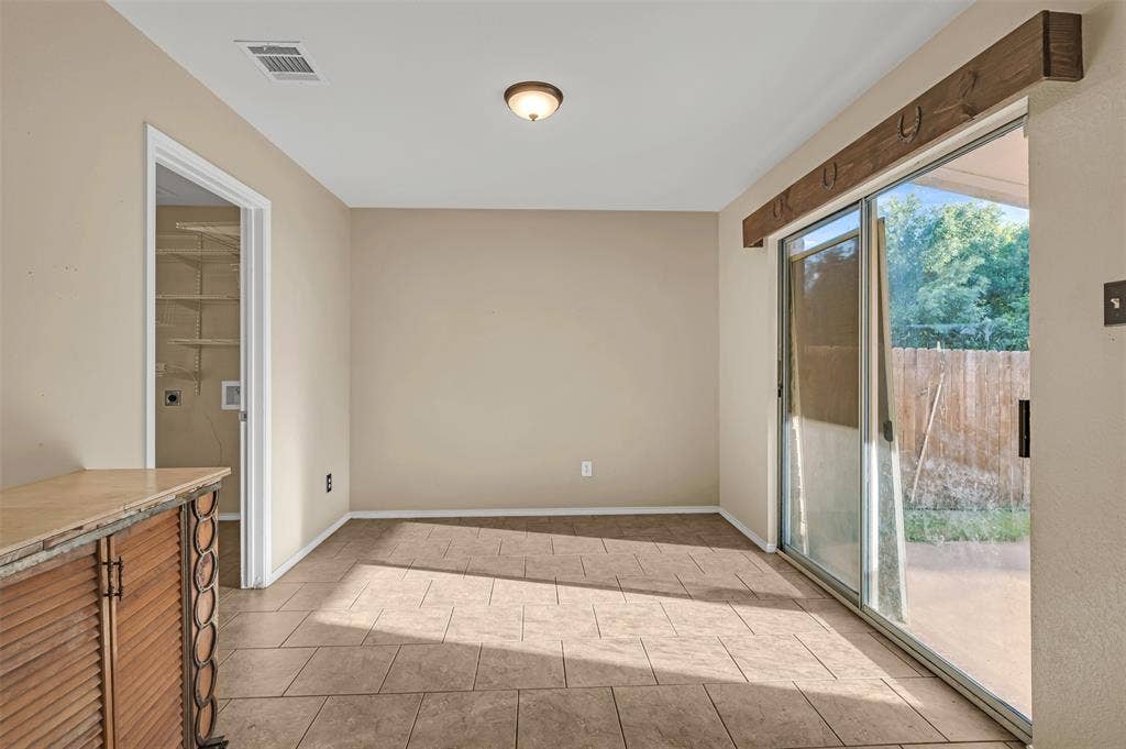 9017 Graywolf Ridge Trail, Fort Worth, TX 76244 Empty room featuring light tile flooring