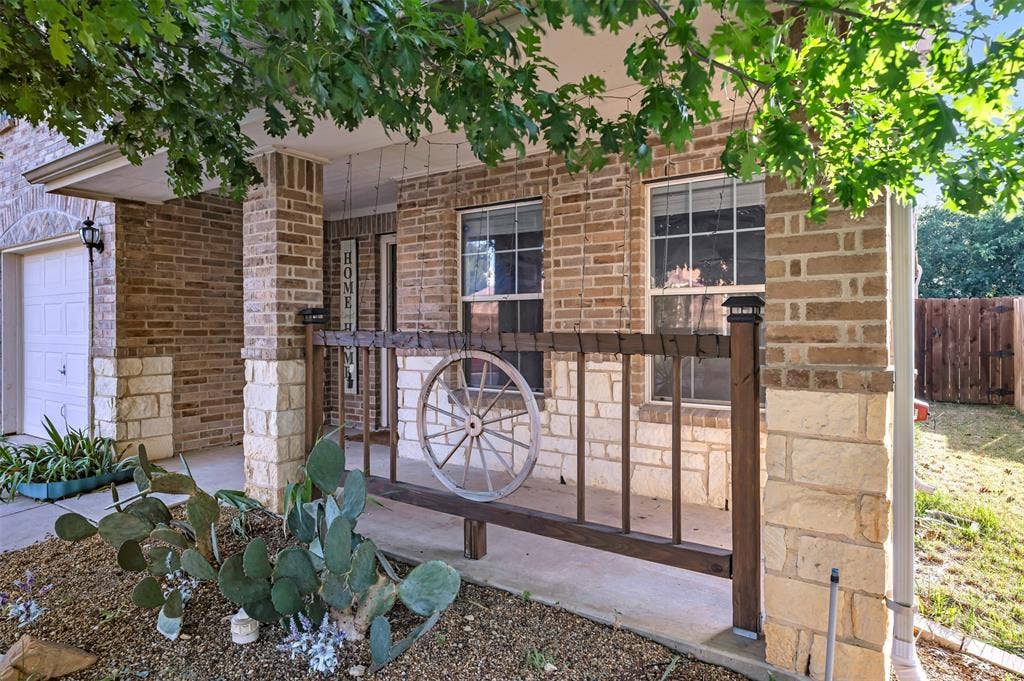 9017 Graywolf Ridge Trail, Fort Worth, TX 76244 Doorway to property with a garage