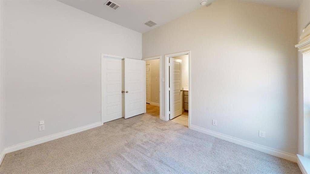 2401 Robin Way, Northlake, TX 76247 Vaulted ceiling with recessed lighting, light-toned carpet, and paneled doors