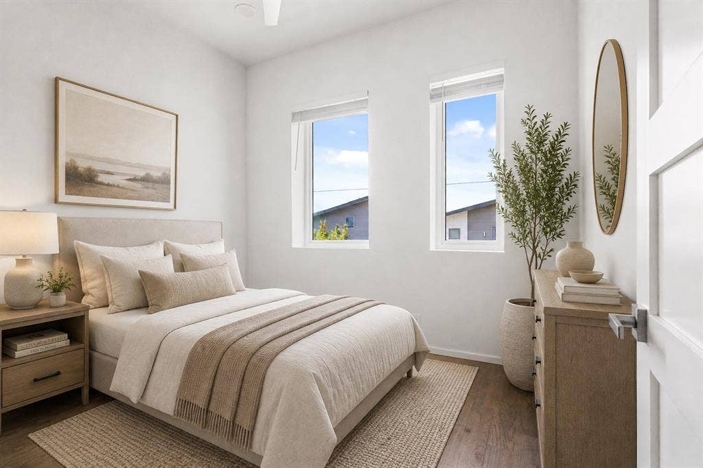 2450 N Garrett Avenue, #14, Dallas, TX 75206 Wood-finish flooring, white walls, and a ceiling fan