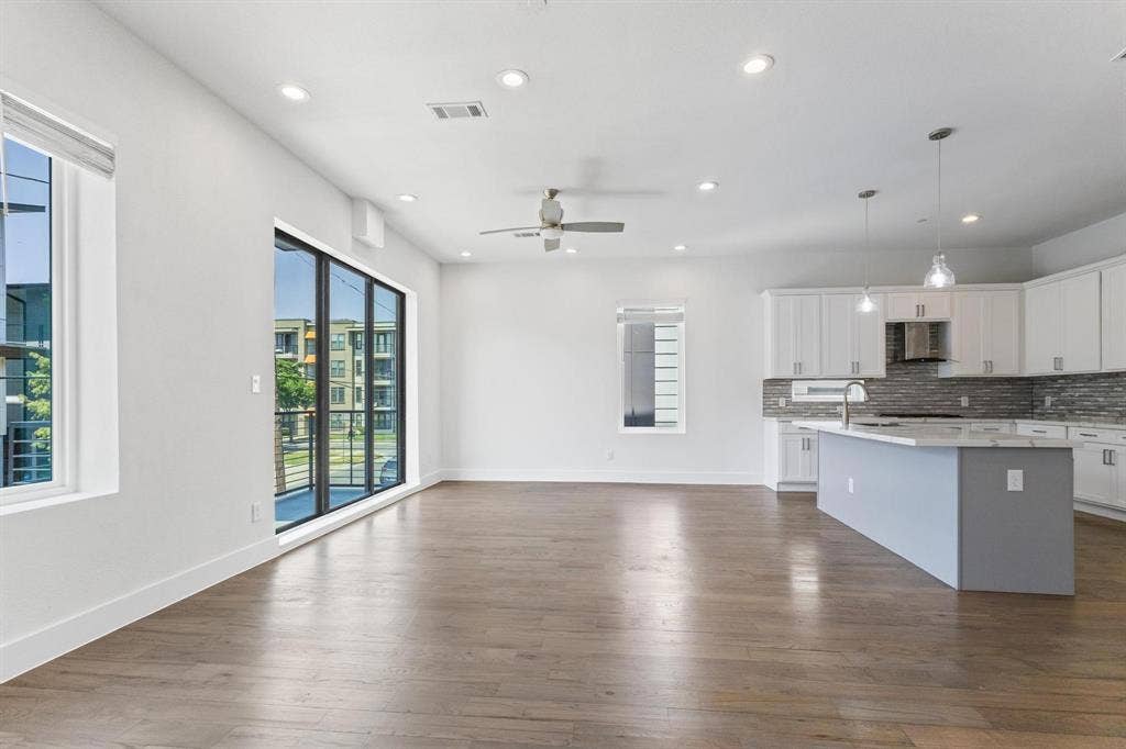 2450 N Garrett Avenue, #14, Dallas, TX 75206 Open-concept living space with wood-finish flooring, recessed lighting, and a ceiling fan