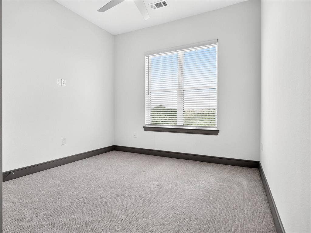 2700 Old Denton Road, #2212, Carrollton, TX 75007 Recessed lighting, ceiling fan, carpet flooring, window with blinds, and dark-toned trim