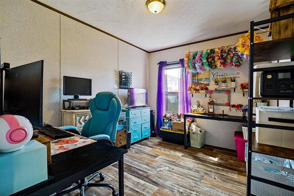 4415 Woodland Drive, Granbury, TX 76048 Wood-finish flooring throughout