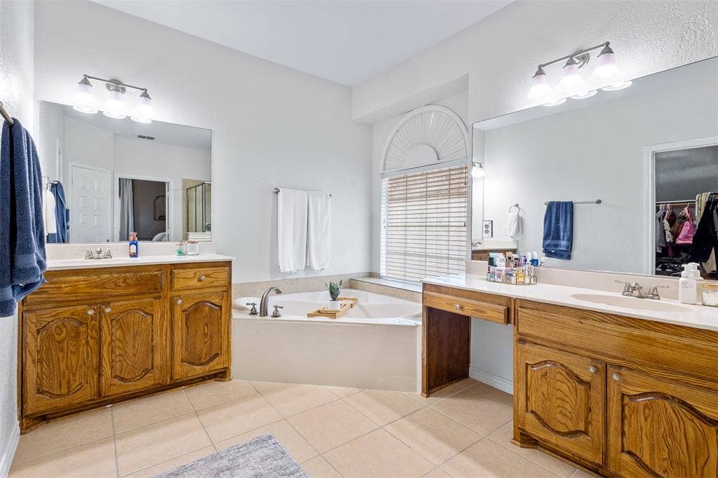 5413 Compassion Drive, Midlothian, TX 76065 Dual vanity sinks with wood cabinetry