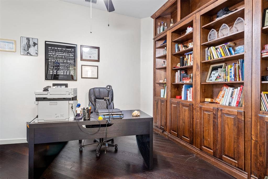 5413 Compassion Drive, Midlothian, TX 76065 Room featuring dark wood-finish flooring, white walls, and built-in wood cabinetry with integrated shelving