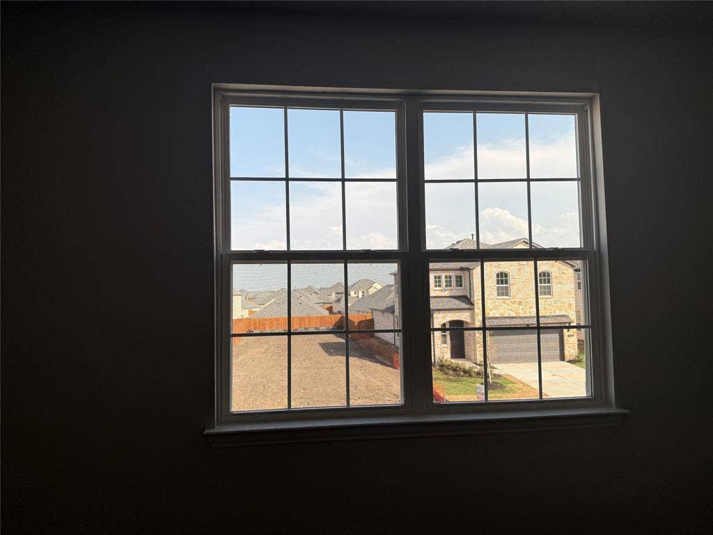 White-framed window with grid pattern