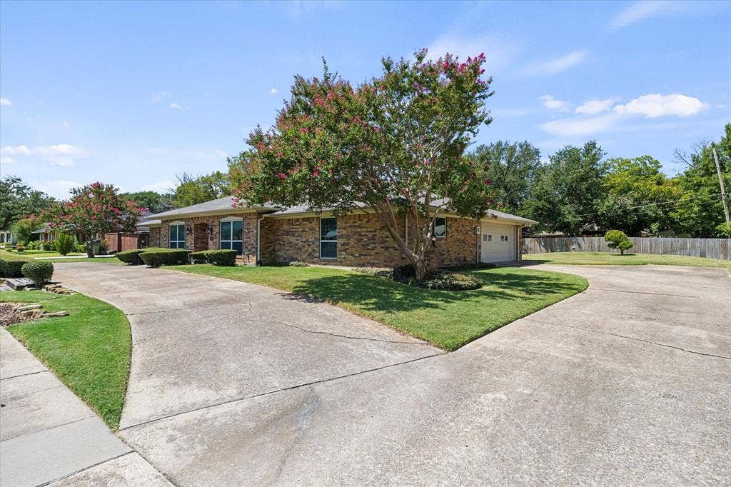 4001 Keele Drive, Garland, TX 75041 Notice the side garage entry.