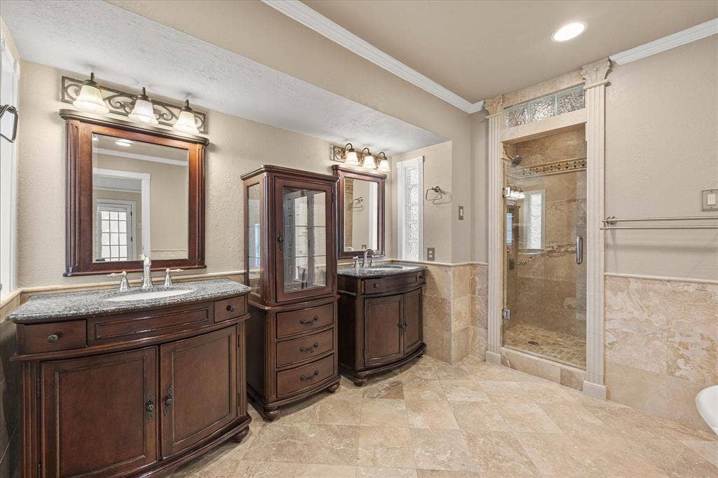 4001 Keele Drive, Garland, TX 75041 Beautiful vanities that add additional storage.
