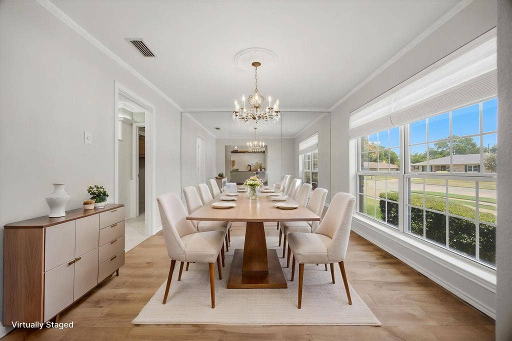 4001 Keele Drive, Garland, TX 75041 Virtually staged formal dining area conveniently located next to the kitchen- perfect for effortless entertaining. This area also features the Hunter Douglas Vignette Stacking Lite Rise Top Down-Bottom-Up window shades. Convenient and very classic.