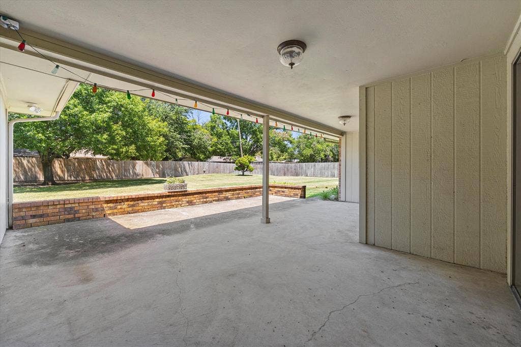 4001 Keele Drive, Garland, TX 75041 Covered patio overlooking the spacious backyard.