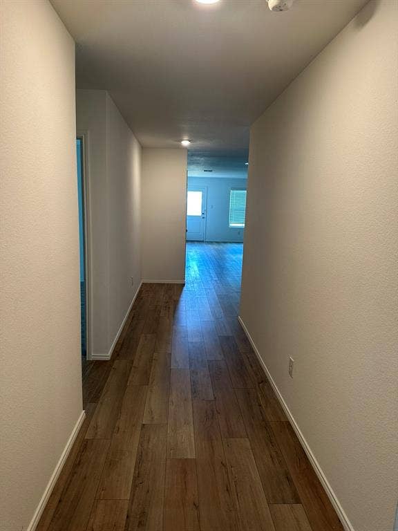 5705 Manarchos Lane, Forney, TX 75126 Hall featuring dark wood-style flooring and baseboards